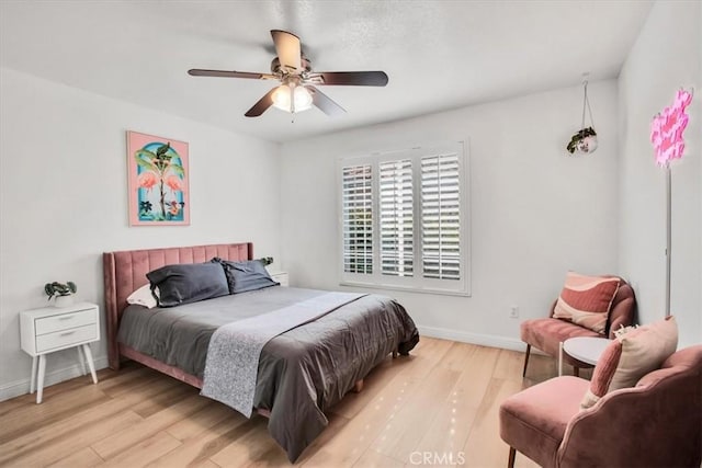 bedroom featuring ceiling fan and light wood-type flooring