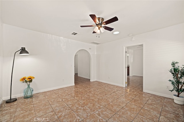 empty room featuring ceiling fan