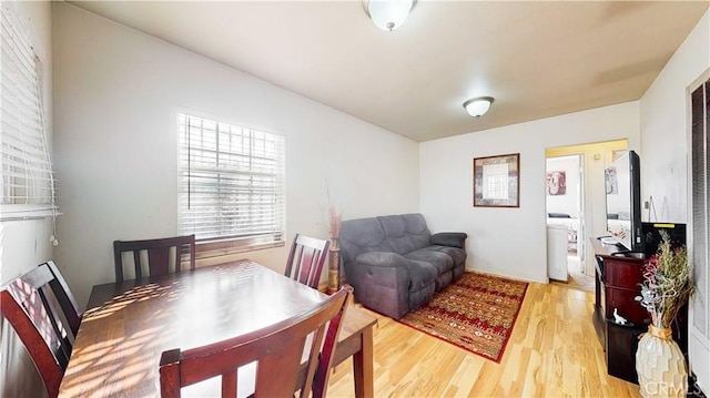 dining area with light wood-type flooring