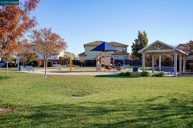 view of play area featuring a lawn