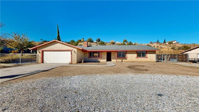 single story home featuring a garage