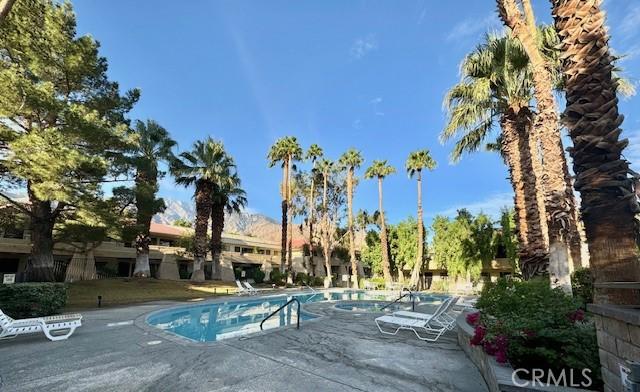 community pool featuring a patio area