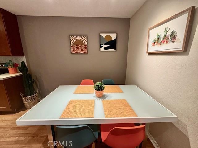 dining room featuring light wood-style floors