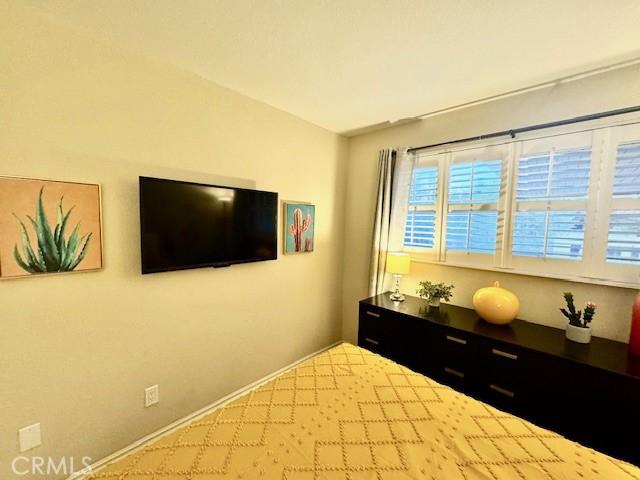 unfurnished bedroom with baseboards