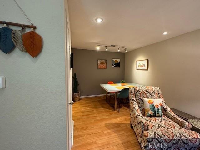 dining space featuring recessed lighting, baseboards, and light wood-style floors