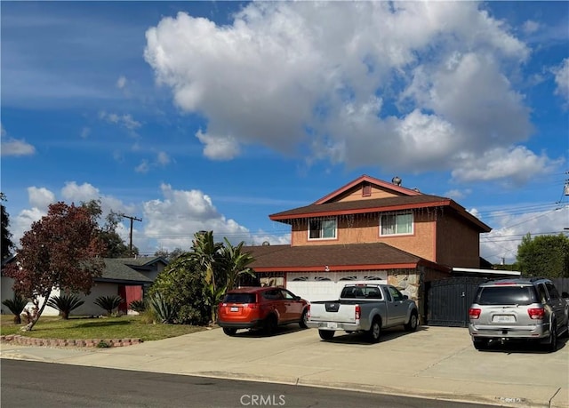 front facade with a garage