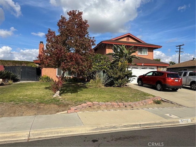 view of property hidden behind natural elements with a garage and a front yard