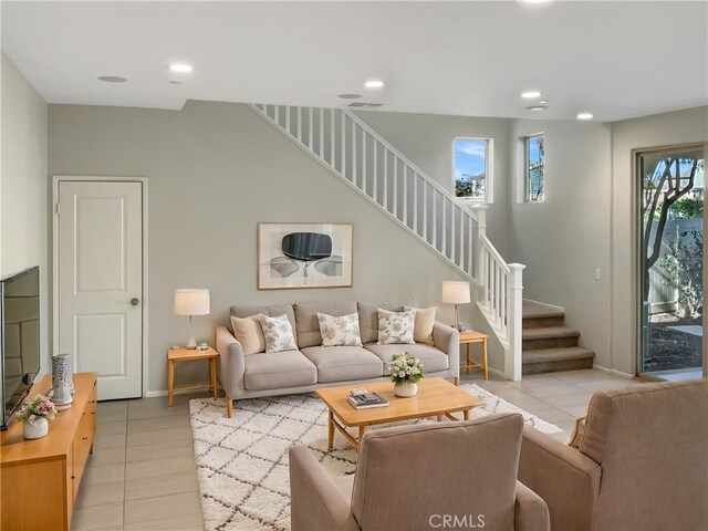 living room featuring light tile patterned flooring