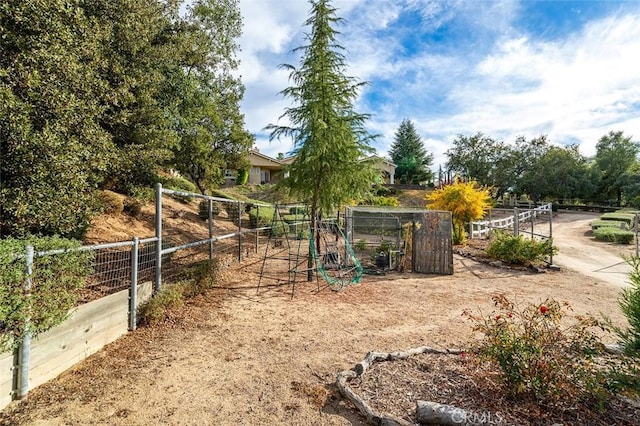 view of yard featuring fence