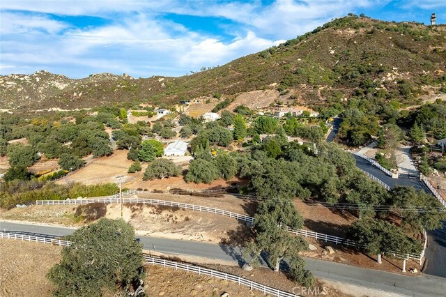 bird's eye view featuring a mountain view and a rural view