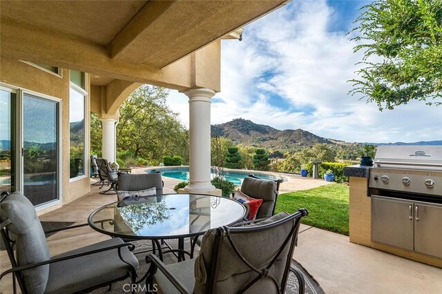 view of patio with a mountain view