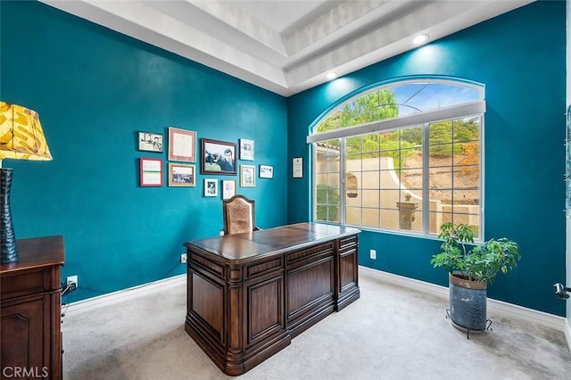 home office featuring carpet flooring and baseboards