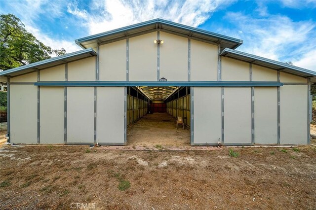 view of home's exterior featuring an outdoor structure