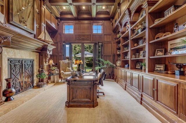 office with ornamental molding, coffered ceiling, light colored carpet, beam ceiling, and wood walls