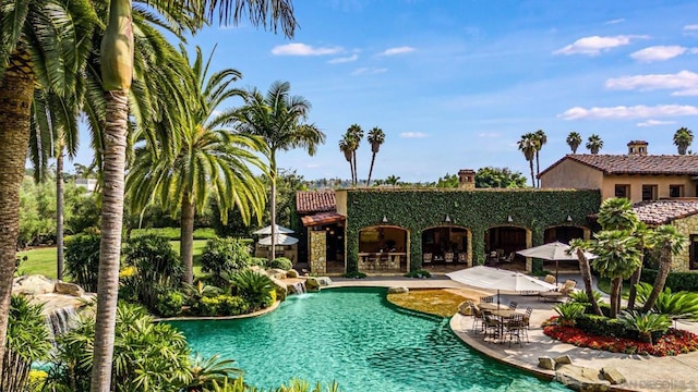 view of swimming pool featuring a patio