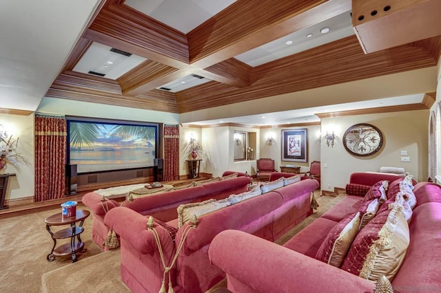 home theater featuring beam ceiling, ornamental molding, and coffered ceiling