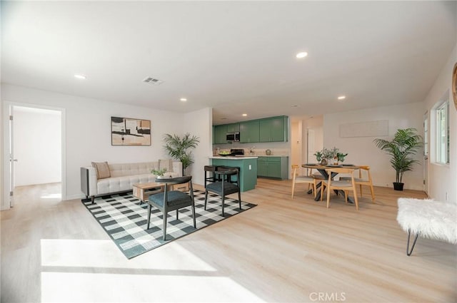 living room featuring light hardwood / wood-style flooring