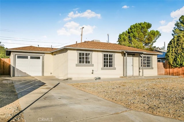 single story home featuring a garage