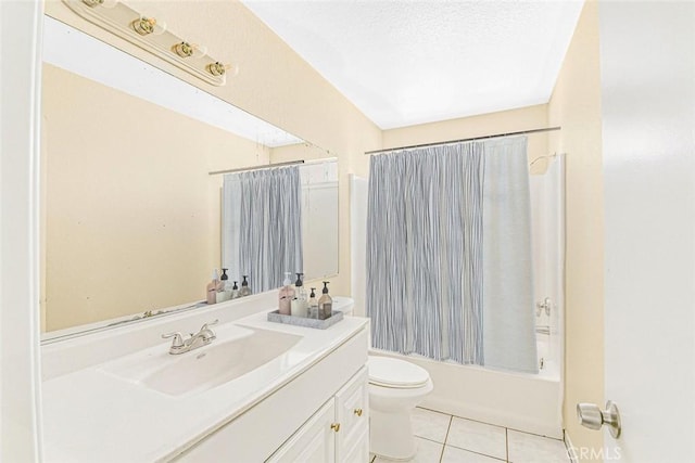 full bathroom with shower / bath combo, vanity, tile patterned floors, toilet, and a textured ceiling