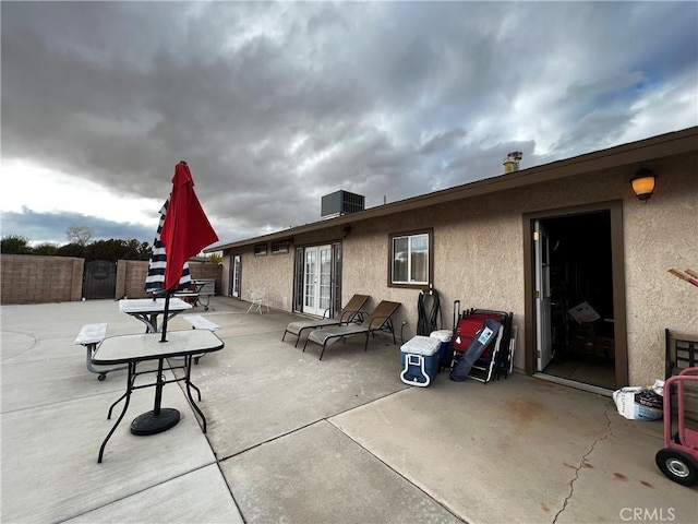 15353 El Centro Rd, Hesperia, CA 92345 - view of patio / terrace with french doors and central air condition unit