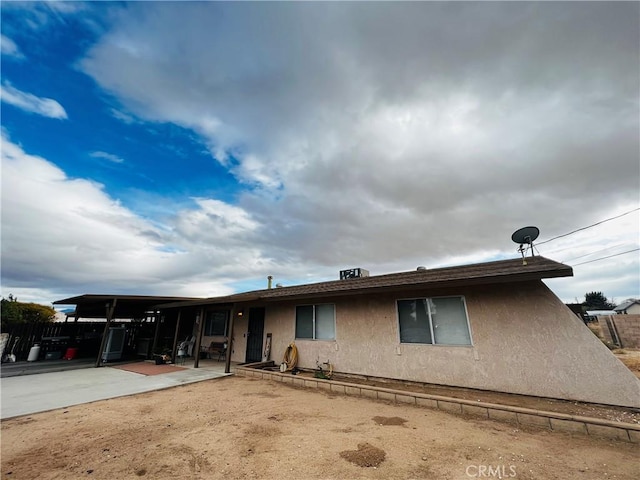 15353 El Centro Rd, Hesperia, CA 92345 - view of front facade with stucco siding and a patio