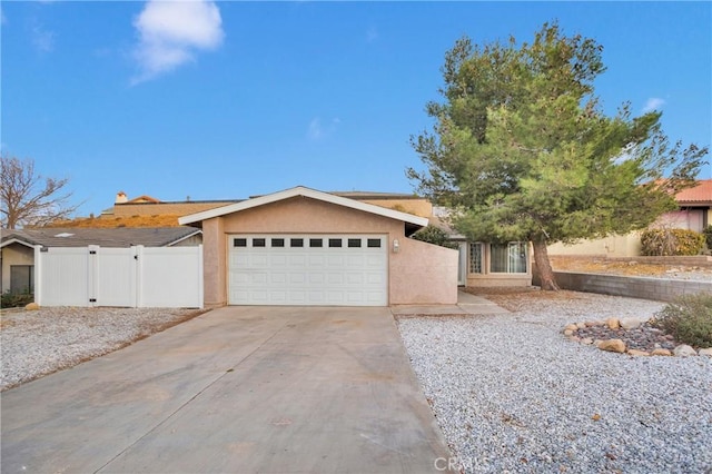 ranch-style house featuring a garage