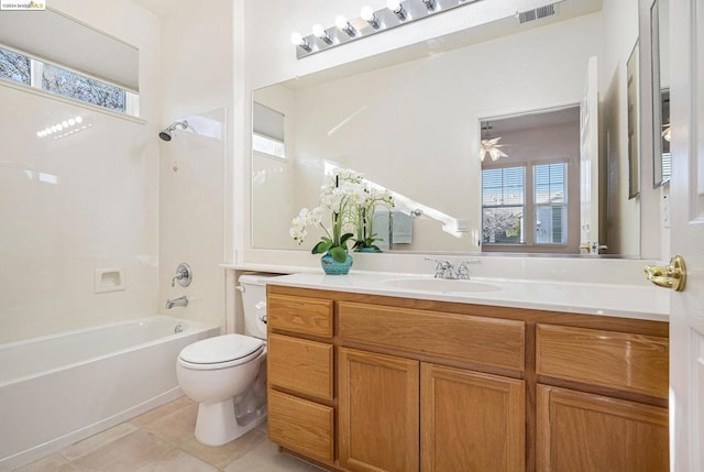 full bathroom with vanity, tile patterned floors, ceiling fan, toilet, and shower / bathtub combination