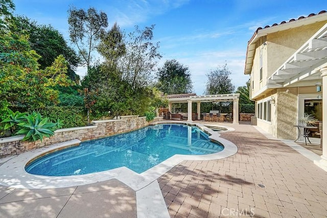 view of swimming pool featuring a pergola and a patio area