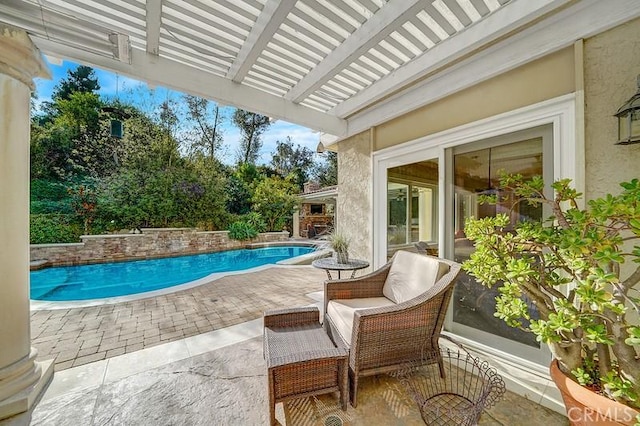 view of pool featuring a pergola and a patio area