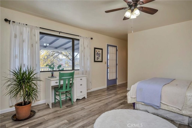 bedroom featuring ceiling fan and light hardwood / wood-style flooring