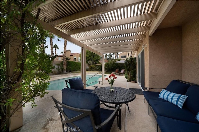 view of patio featuring a fenced in pool, an outdoor hangout area, and a pergola