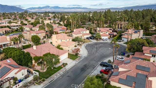 drone / aerial view featuring a mountain view