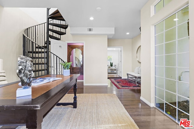 interior space with dark hardwood / wood-style floors