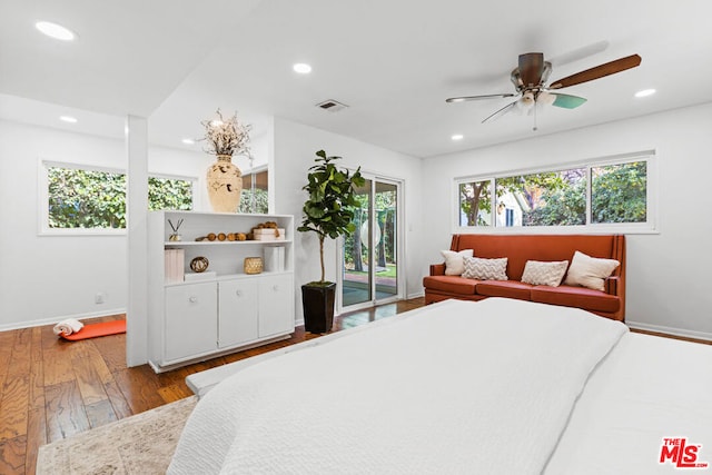 bedroom with ceiling fan, access to exterior, and hardwood / wood-style floors