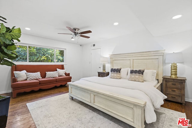 bedroom featuring ceiling fan and hardwood / wood-style floors