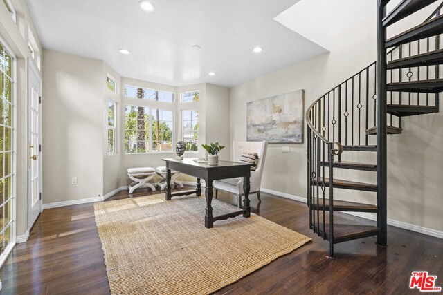 office space with dark hardwood / wood-style floors