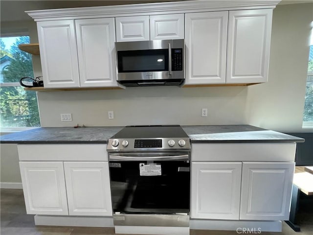 kitchen with white cabinets and stainless steel appliances