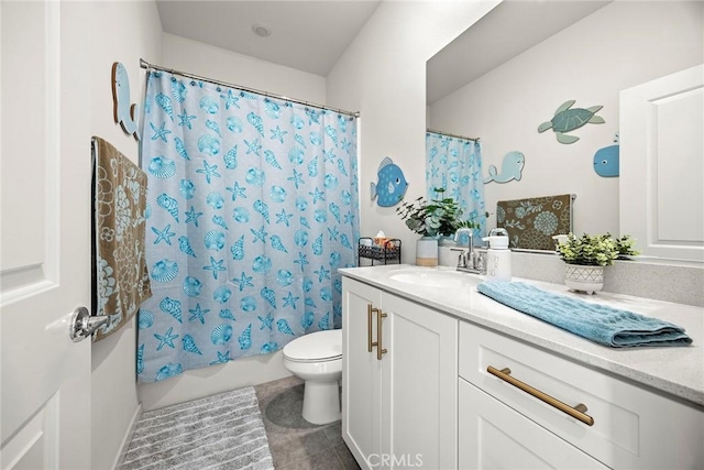 full bathroom featuring tile patterned floors, vanity, toilet, and shower / bathtub combination with curtain