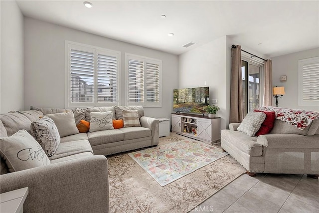 living room featuring light tile patterned floors