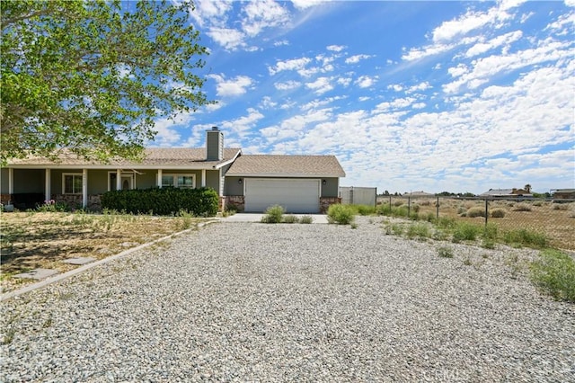 single story home with a garage