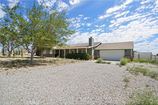 single story home featuring a garage