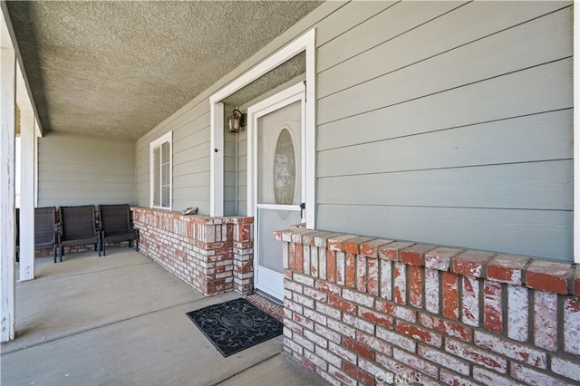 property entrance with a porch