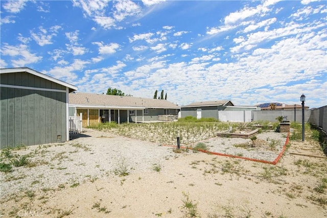 view of yard featuring a sunroom