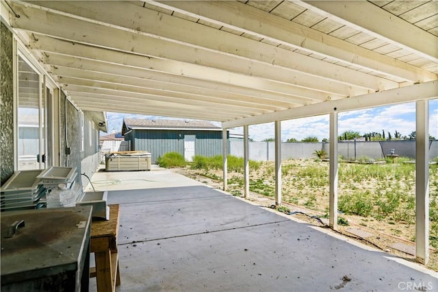 view of patio featuring a hot tub