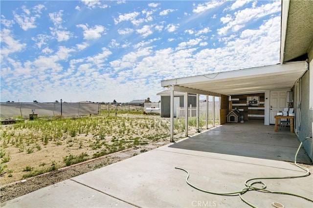 view of patio featuring a carport