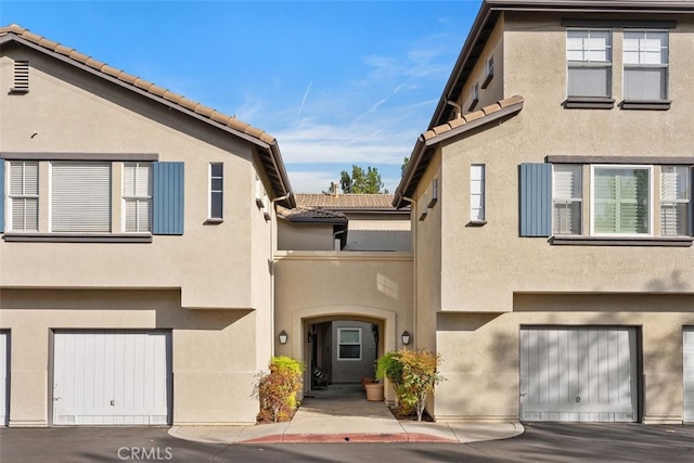 view of property featuring a garage