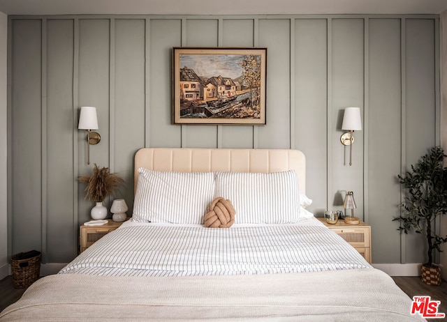 bedroom featuring hardwood / wood-style flooring