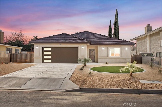 view of front of home featuring a garage