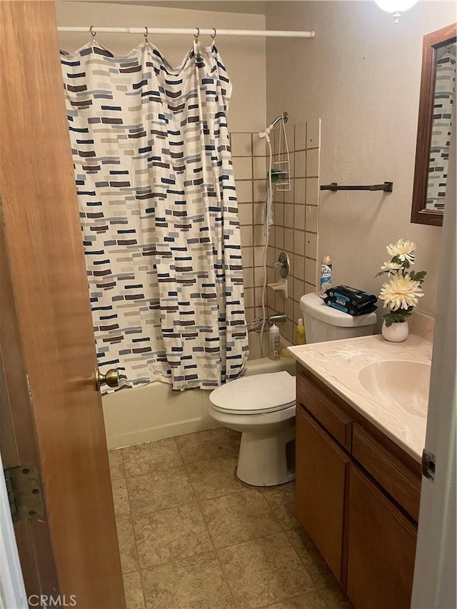 full bathroom featuring vanity, toilet, and shower / bath combo with shower curtain