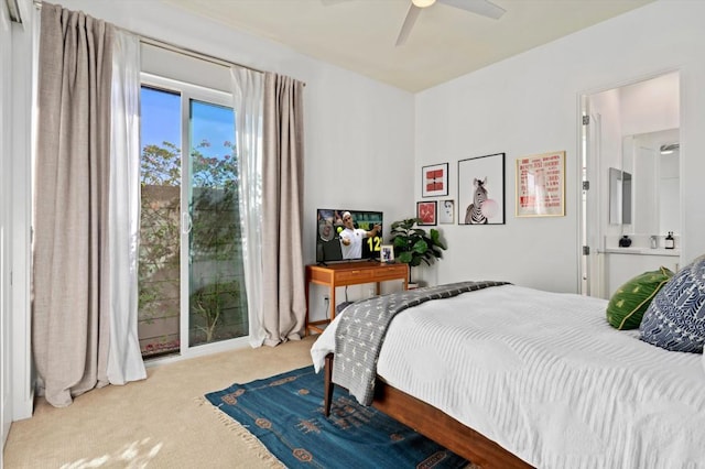 bedroom featuring light colored carpet and ceiling fan